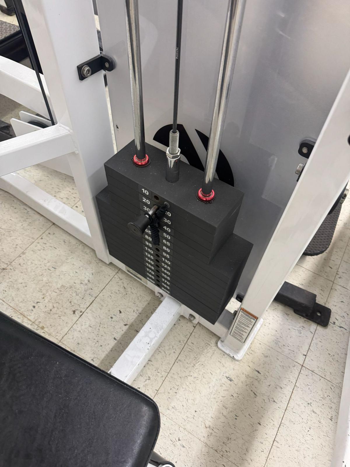 a weight training machine with a black weight stack and a black seat.